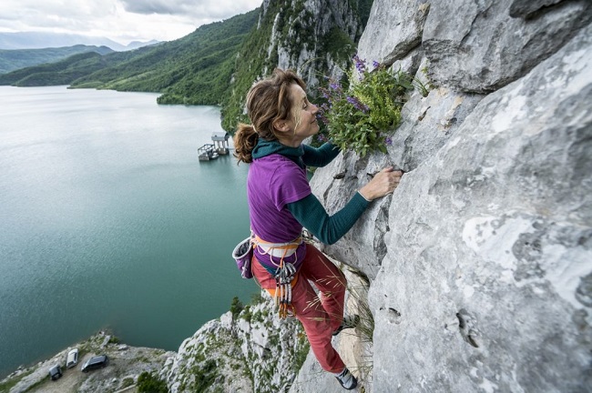 Stéphanie Bodet takes time to “smell the roses” at Bovilla. Photo: Mikey Schaefer View Gallery