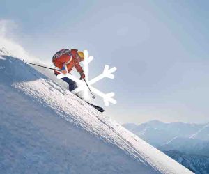 skier rides freeride on powder snow down the slope against the backdrop of the mountains