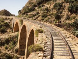 Tracks,Passing,Over,A,Stone,Railway,Bridge,Just,Outside,Of