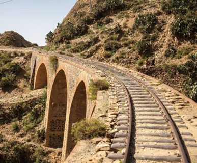 Tracks,Passing,Over,A,Stone,Railway,Bridge,Just,Outside,Of