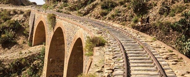 Tracks,Passing,Over,A,Stone,Railway,Bridge,Just,Outside,Of